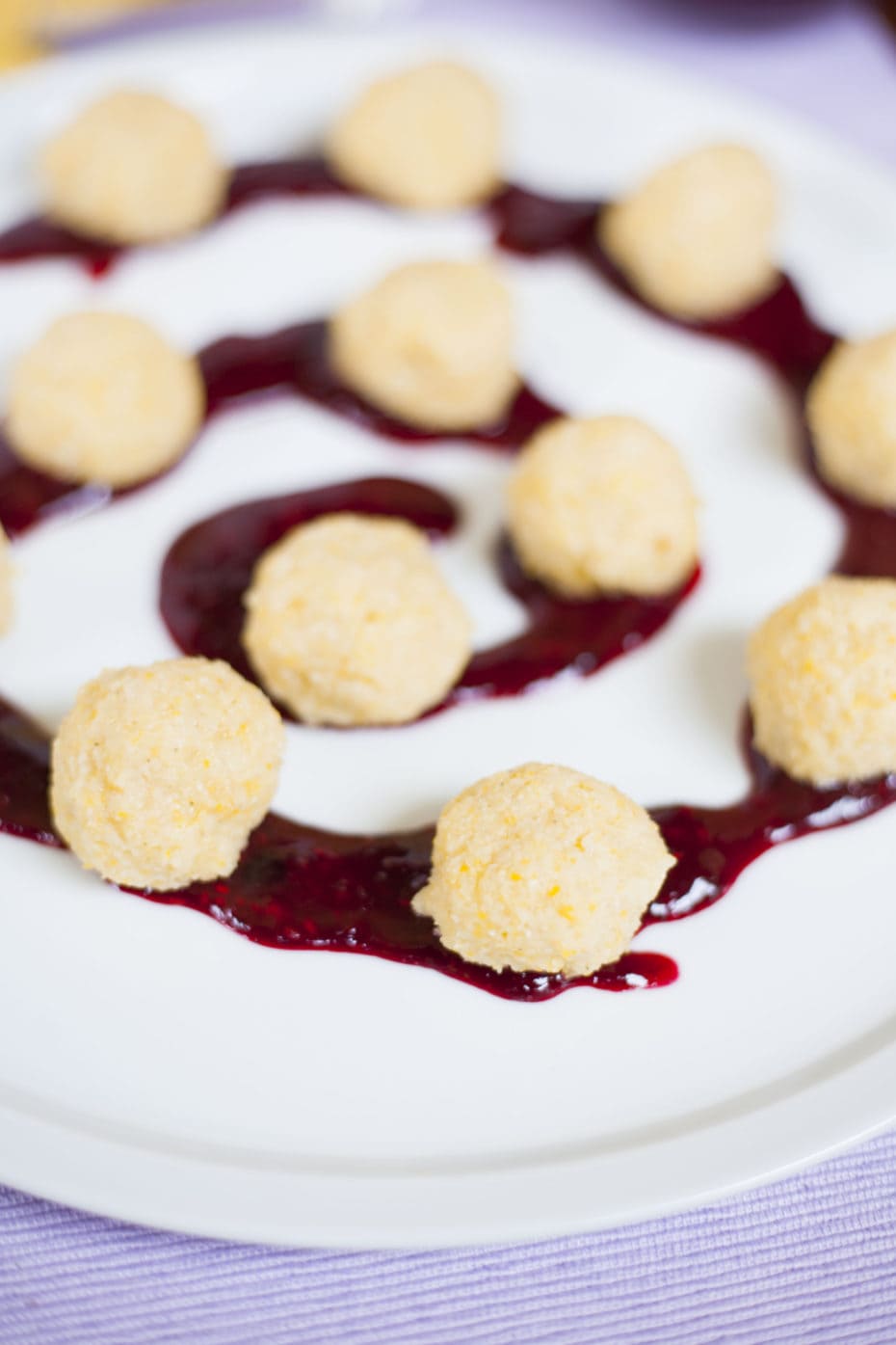 Sweet Millet Balls with Mixed Berries Sauce - This millet-based dessert is unique on its own. If they accompanied by a fruity sauce with a hint of cinnamon, they can be really mouth-watering.