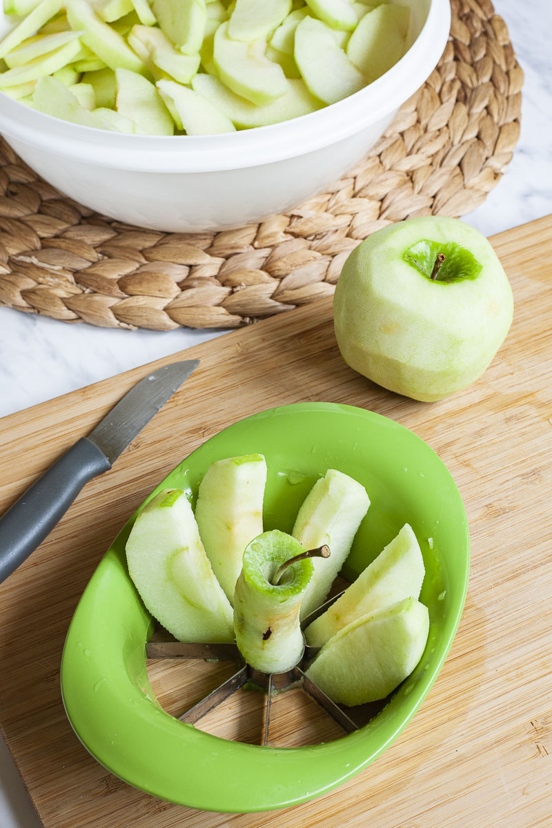 Apple slices in an apple corer.