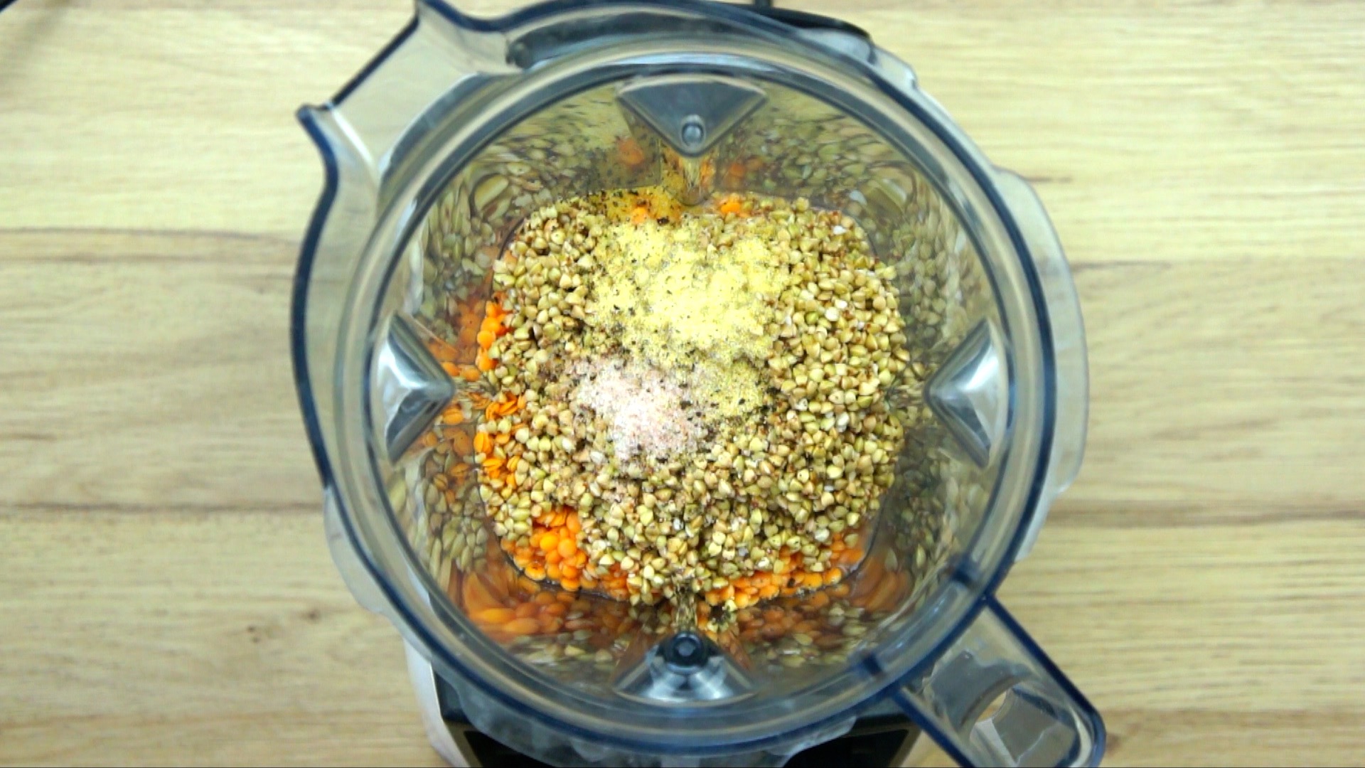 Sunflower seeds, red lentils and spices in a blender.