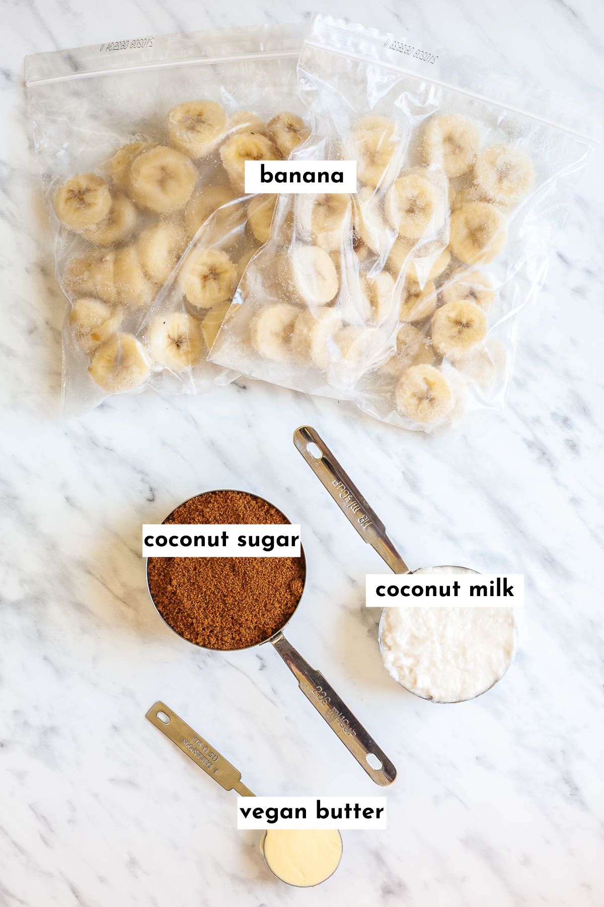 Ingredients to make caramel nice cream, frozen bananas in ziplock bag, cup of dark coconut sugar, cup of white cream and a tablespoon of butter
