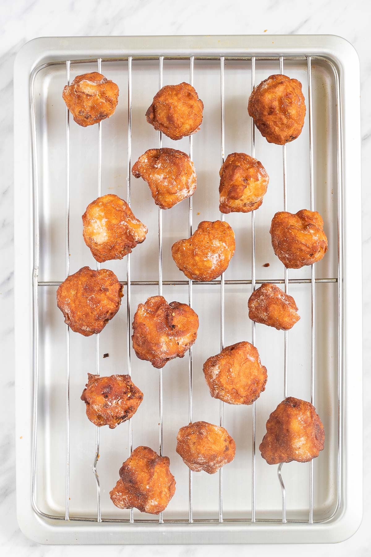 Crispy brown battered cauliflower florets.