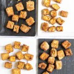 Crispy brown tofu cubes on 4 different plates of white and black.