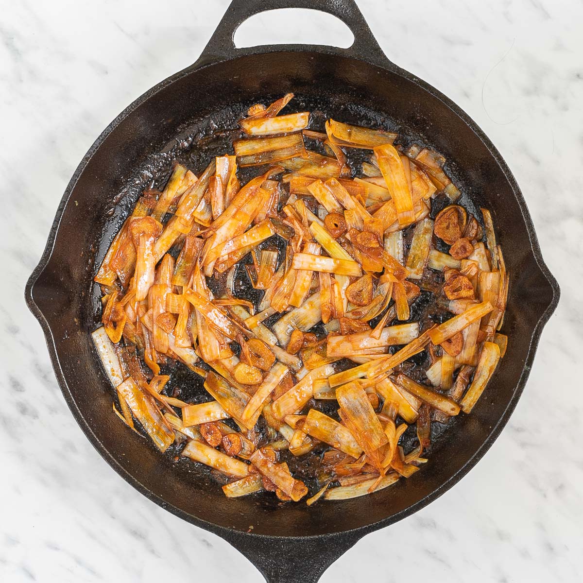 Skillet with caramelized onion slices.