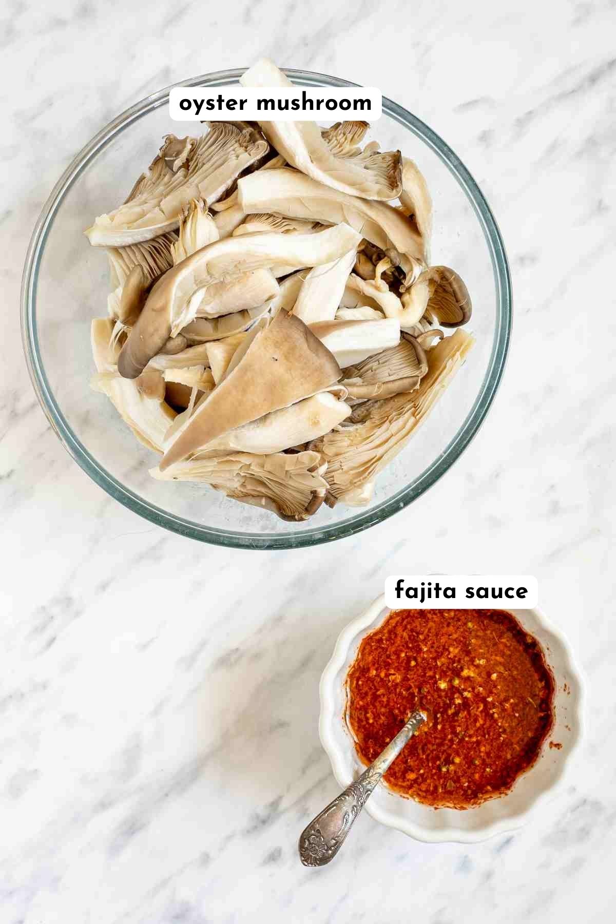 Shredded mushroom and red sauce in bowls.