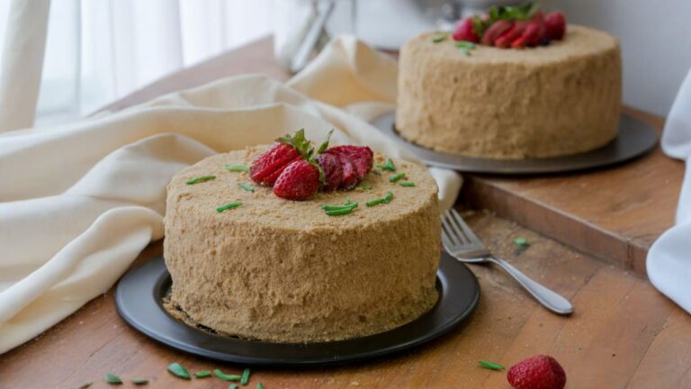 a chocolate cake with strawberries on top of it