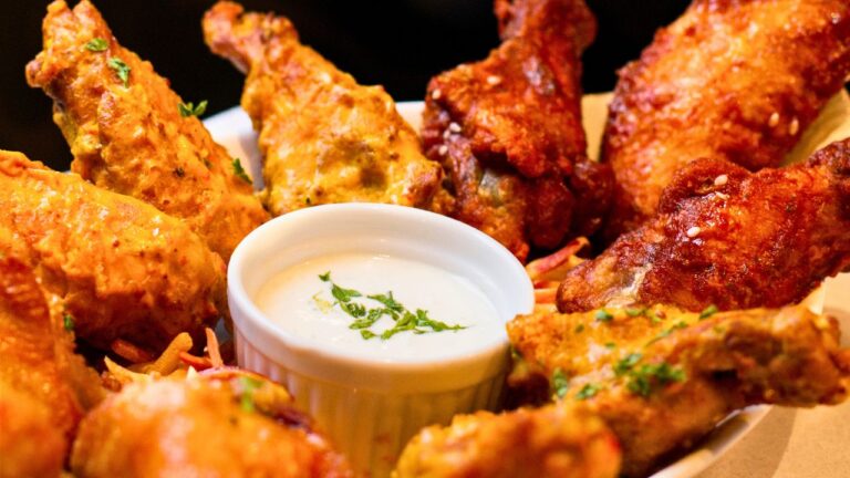 A Stranger Sat Down and Ate the Chicken Wings off My Plate. The Waitress Refused to Comp the Meal.