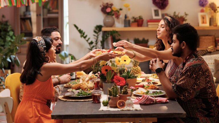 Couple Stacked Their Messy Used Plates Into a Tower While Their Friends Were Still Eating. The Table Was Baffled.
